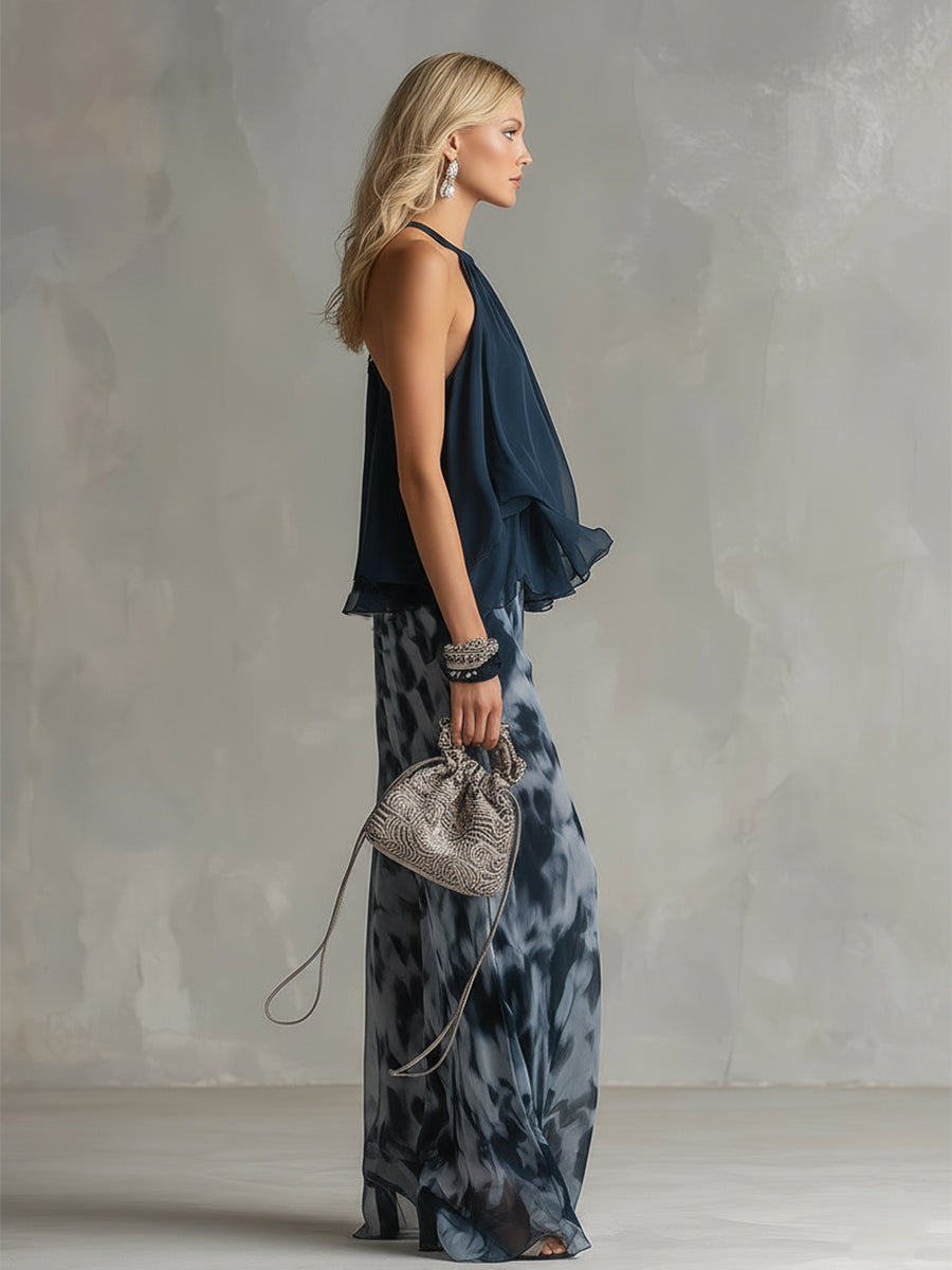 Luisa - Elegantes Chiffon-Kleid mit hochgeschlossenem Oberteil und weit geschnittenen, gemusterten Hosen.