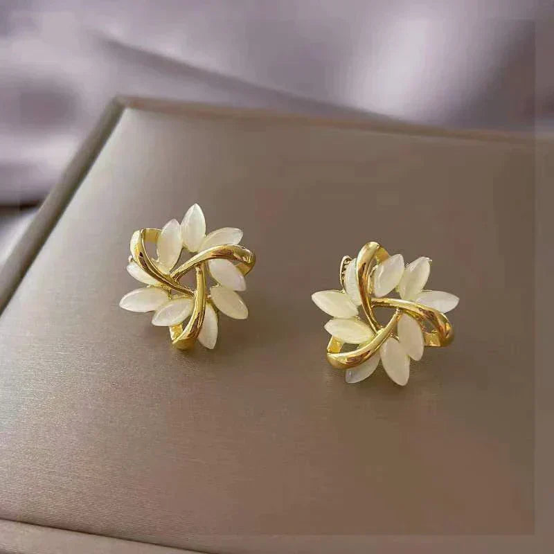Elegante Gold- und Silber-Steckerohrringe
