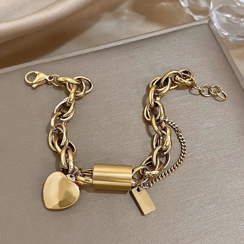 Charm-Armband mit goldenem Herz