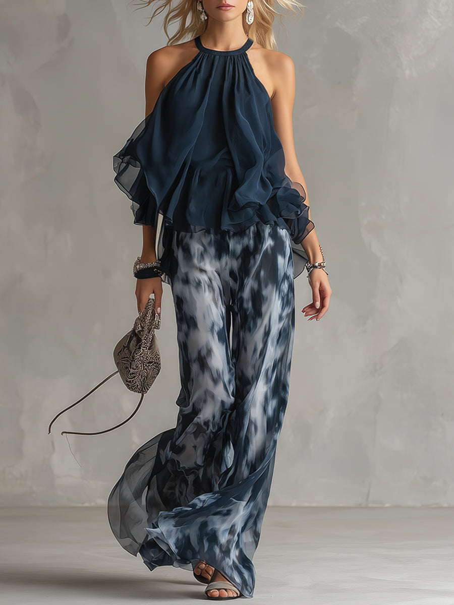 Luisa - Elegantes Chiffon-Kleid mit hochgeschlossenem Oberteil und weit geschnittenen, gemusterten Hosen.